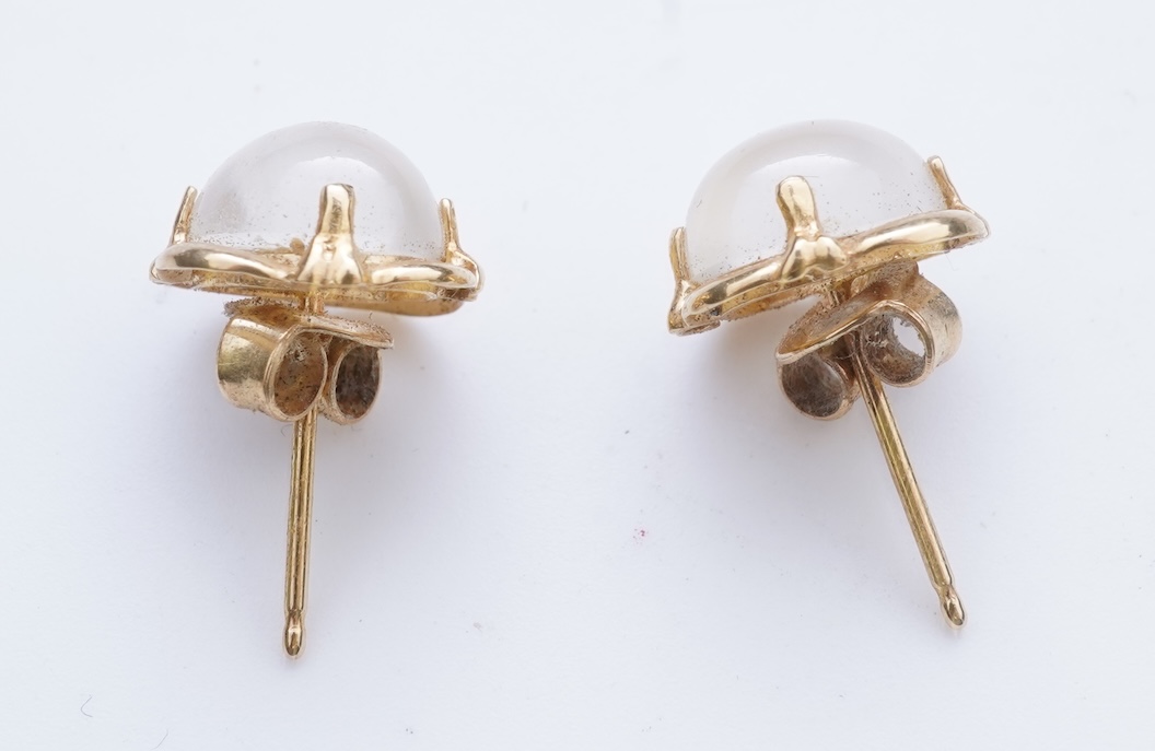 Eight pairs of earrings and pendant, comprising: a pair of onyx studs; a pair of emerald studs; a pair of sapphire and diamond drop earrings; a pair of opal drop earrings; a pair of garnet drop earrings; and a shell pend